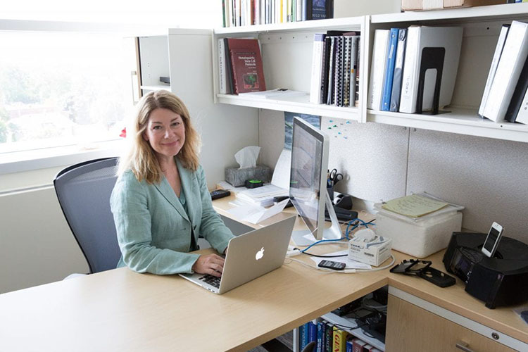 Amy Kalkbrenner in her office.