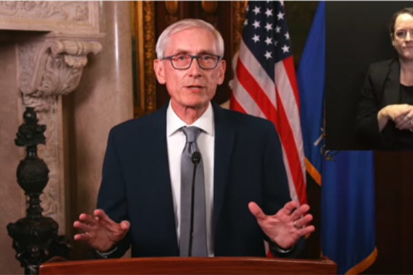 As COVID-19 cases rise, Gov. Evers urges state residents to stay home