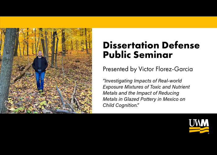 Florez-Garcia standing in a forest with leaves on the ground