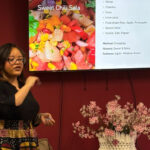 Cheron Copeland, a student in the Nutitional Sciences program at UWM, leads a workshop about healthy eating.