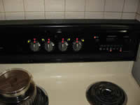 Image depicts burner knobs of an oven. The purpose of this photo is to represent examples of home modifications for the Senior Home Assessment and Repair Project.