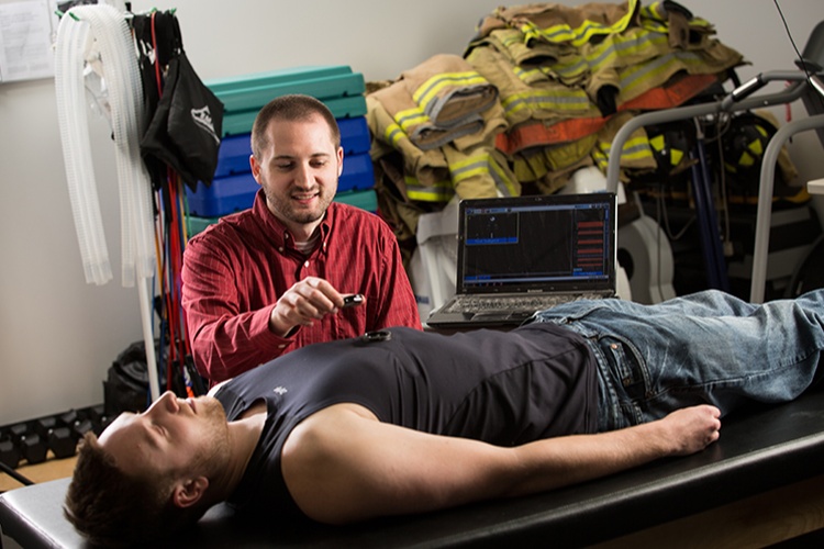 Former Graduate student is looking for ways to prevent deaths from sudden heart attacks after intense activity. His work could help professional athletes, firefighters and others.
