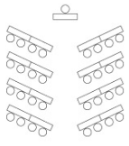 Chevron Room Configuration with rows of tables angled slightly to face the presenter at the front.