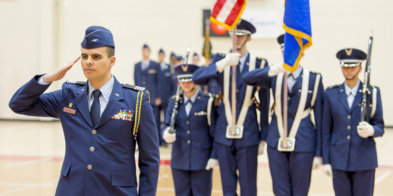 A group of Air Force ROTC students in uniform during a flag ceremony