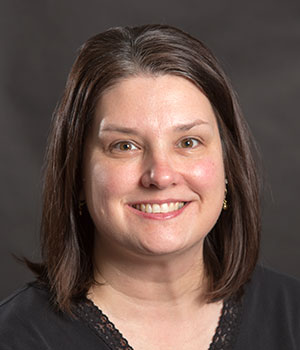 Portrait of Amy Kirby (white woman), clinical associate professor and MSW program coordinator