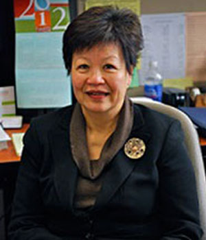 Portrait of Gwat-Yong Lie (asian woman), Associate Professor Emerita for the department of social work