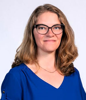 Headshot of Rachel Castillo wearing a blue blouse.