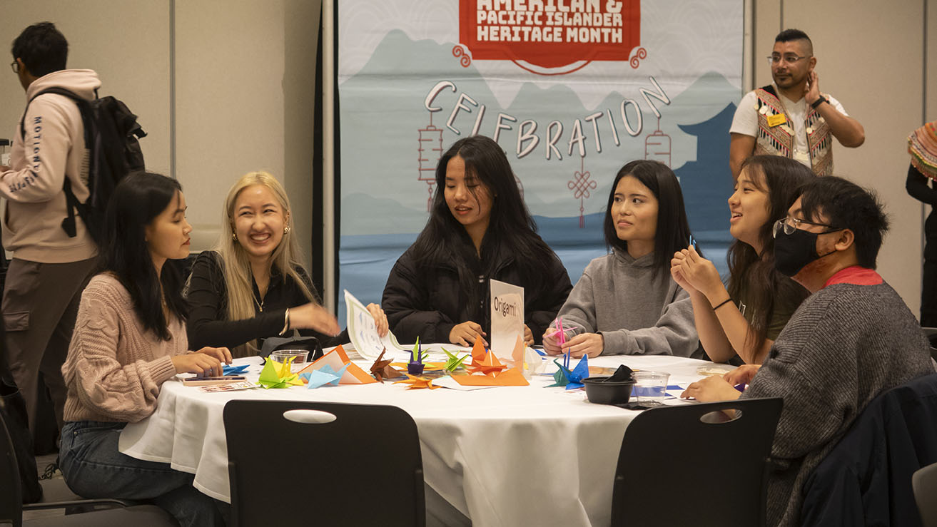 Students at a table celebrating aapi heritage