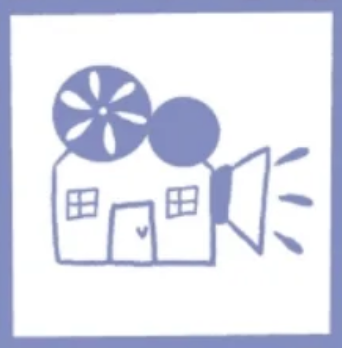 A simple, hand-drawn illustration in blue ink on a white background, featuring a small house merged with a vintage film projector. The house forms the body of the projector, with two windows and a door, while large film reels sit on the roof and a light lens extends from the right side as if projecting a beam.