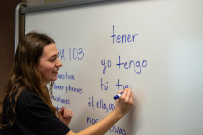 Tutor at the Whiteboard scribing in Spanish 