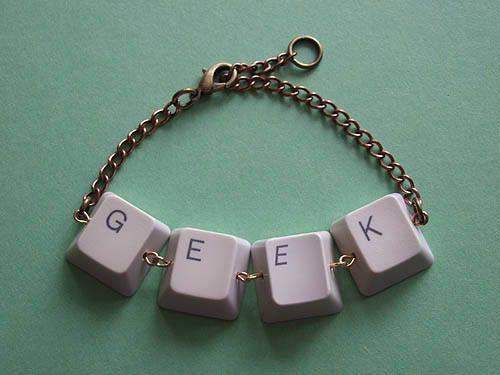 Necklace made from old computer keys spelling GEEK