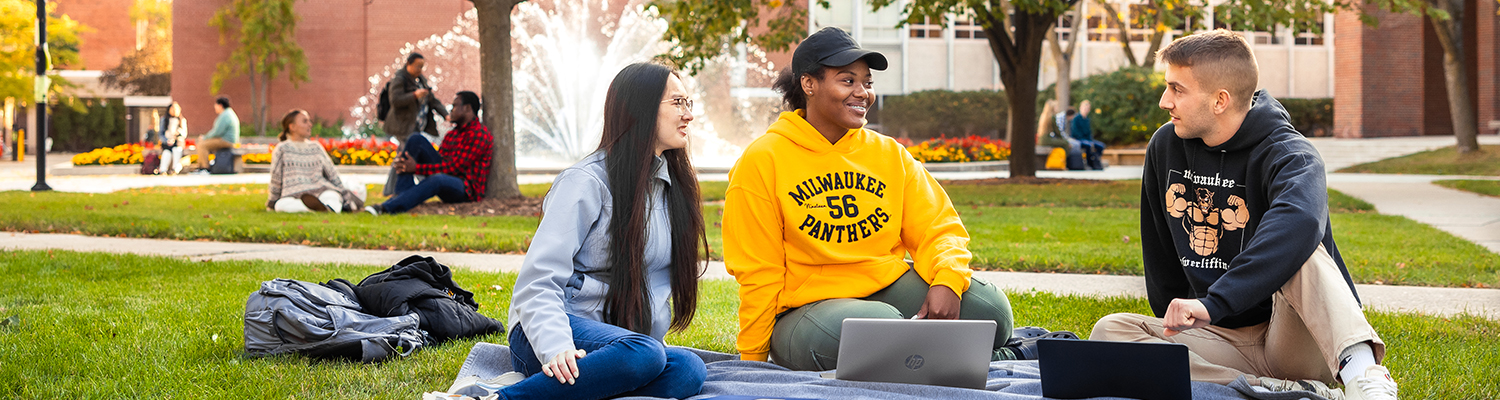 Students studying near the UWM fountain