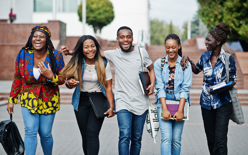 students walking and smiling