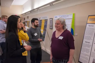 A student talking about the poster