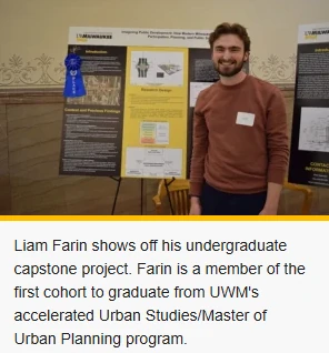Liam Farin shows off his undergraduate capstone project. Fann is a member of the first cohort to graduate from UWM's accelerated Urban Studies/masters of Urban Planning program.