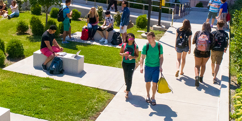 Students outside on a college campus