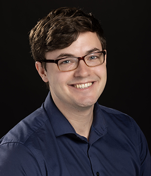 A headshot of Ian Kendrick