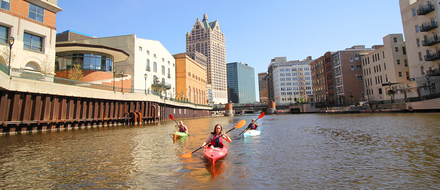 Students kayaking on the Milwaukee River.