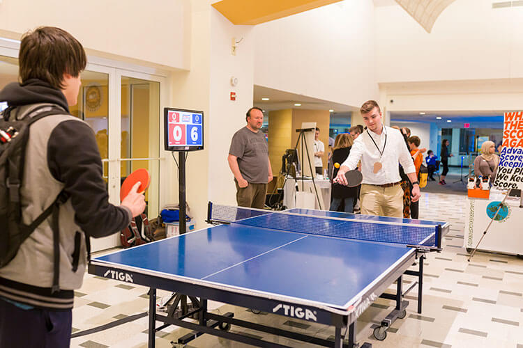 Students playing table tennis