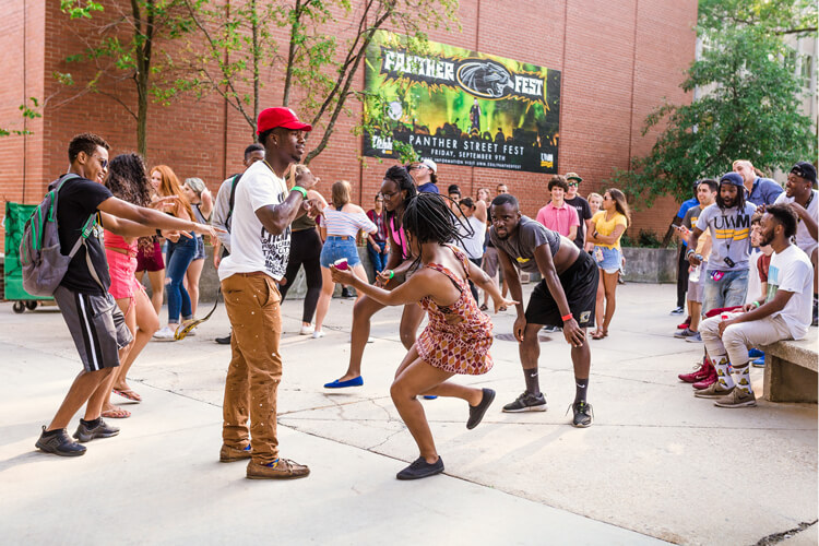 Students at dancing at the Panther Street Fest