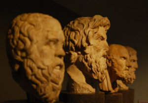 Statue heads of ancient philosophers in a row