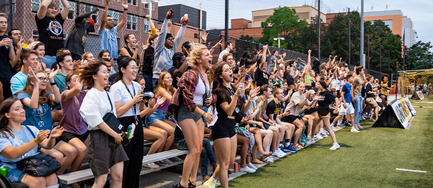 View of a crowd of UWM students cheering on soccer team