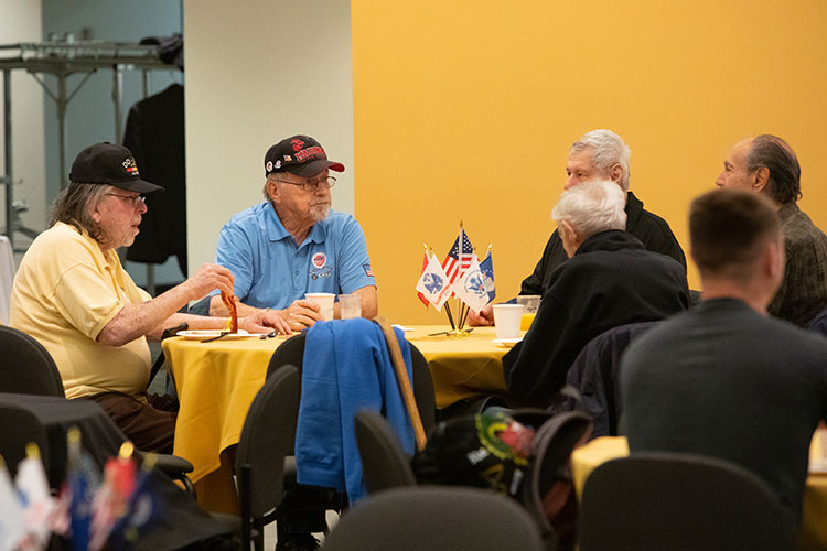 Veterans sitting at a table and enjoying brunch